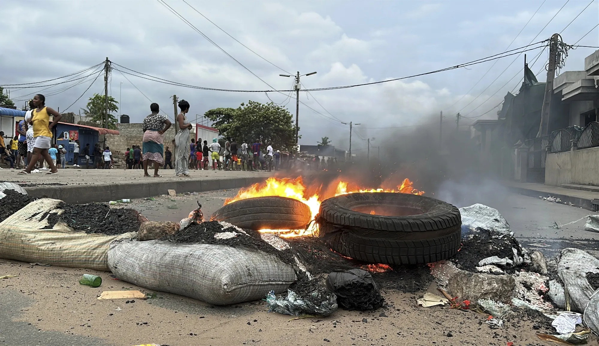 Barricades burn on the streets in Maputo, Mozambique, on Dec. 28.